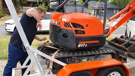 how to strap down a mini excavator|adelaide mini excavator strapping instructions.